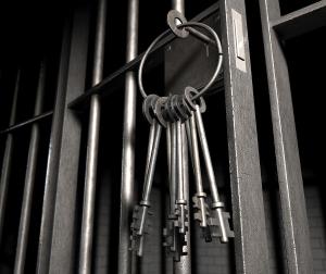 jail-cell-with-open-door-and-bunch-of-keys-allan-swart